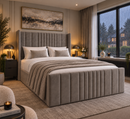 Hampshire upholstered bed with vertical panel headboard and matching footboard, angled view