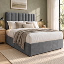 Lyon upholstered divan storage bed and headboard in a modern bedroom, three-quarter view