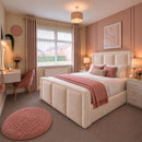 Mona upholstered bed in a blush and cream bedroom