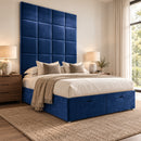 Rome upholstered divan storage bed and headboard in a modern bedroom, three-quarter view