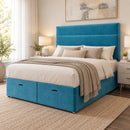 Sara upholstered divan storage bed and headboard in a modern bedroom, opposite three-quarter view